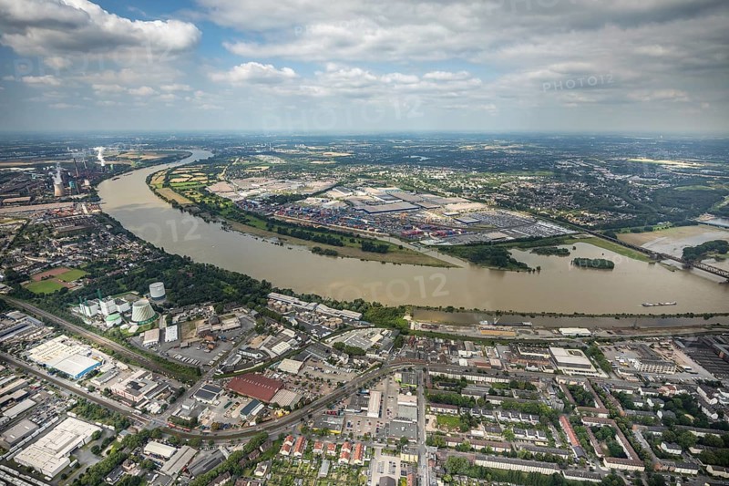 Aerial view, flood river Rhine, logport I, logistics terminal, container port, automobile logistics, Wanheimerort, Duisburg, Ruhr area, North Rhine-Westphalia, Germany, D3T Duisburg Trimodal Terminal, DE, Europe, flood, flood of the century, logistics, logistics service, logistics service provider, logistics provider, logistics centre, aerial view, aerial photography, aerial photography, Duisburg water level, Rhine flood, heavy rain, terminal, transport service, overview, bird's-eye view, bird's-eye view, logport 1, overview, flooding