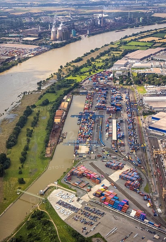 Aerial view, flood river Rhine, logport I, logistics terminal, container port, automobile logistics, Wanheimerort, Duisburg, Ruhr area, North Rhine-Westphalia, Germany, D3T Duisburg Trimodal Terminal, DE, Europe, flood, flood of the century, logistics, logistics service, logistics service provider, logistics provider, logistics centre, aerial view, aerial photography, aerial photography, Duisburg water level, Rhine flood, heavy rain, terminal, transport service, overview, bird's-eye view, bird's-eye view, logport 1, overview, flooding