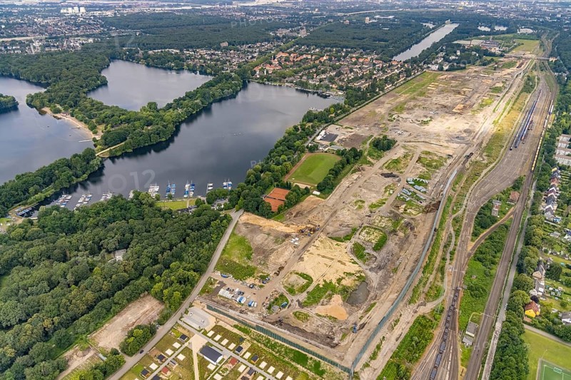 Aerial view, former marshalling yard Wedau, planned new Duisburg residential quarter, Wedau, Duisburg, Ruhr area, North Rhine-Westphalia, Germany, railway tracks, construction work, construction vehicles, construction area, construction site, construction project, construction site, DE, development, Europe, industrial plants, industrial area, industrial site, capacity requirements, aerial view, aerial photography, aerial photography, aerial photography, redevelopment, overview, bird's-eye view, birds-eyes view, derelict railway area, overview