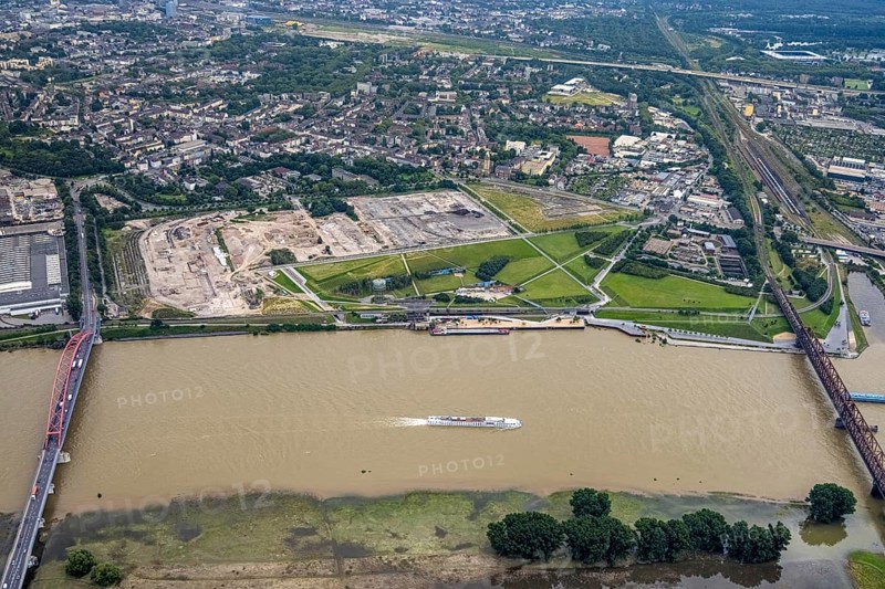Aerial view, flood river Rhine, construction site new building quarter Rheinort, construction area at Rheinpark Duisburg, Hochemmerich, Duisburg, Ruhr area, North Rhine-Westphalia, Germany, construction work, construction area, construction site, building plots, construction project, construction site, DE, Europe, flood, flood of the century, aerial photograph, aerial photography, aerial photography, new building, gauge Duisburg, Rhine flood, heavy rain, overview, bird's eye view, birds-eyes view, overview, flooding