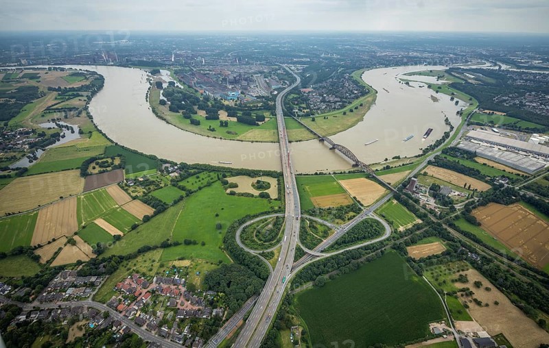 Aerial view, flood river Rhine, motorway A42 Beeckerwerther Brücke and Haus-Knipp-Eisenbahnbrücke with view of Beeckerwerth, Rheinbogen, Bärl, Duisburg, Ruhr area, North Rhine-Westphalia, Germany, motorway, bridge, DE, Europe, flood, flood of the century, aerial view, aerial photography, aerial photography, aerial photography, gauge Duisburg, Rhine flood, heavy rain, overview, bird's-eye view, overview, flooding