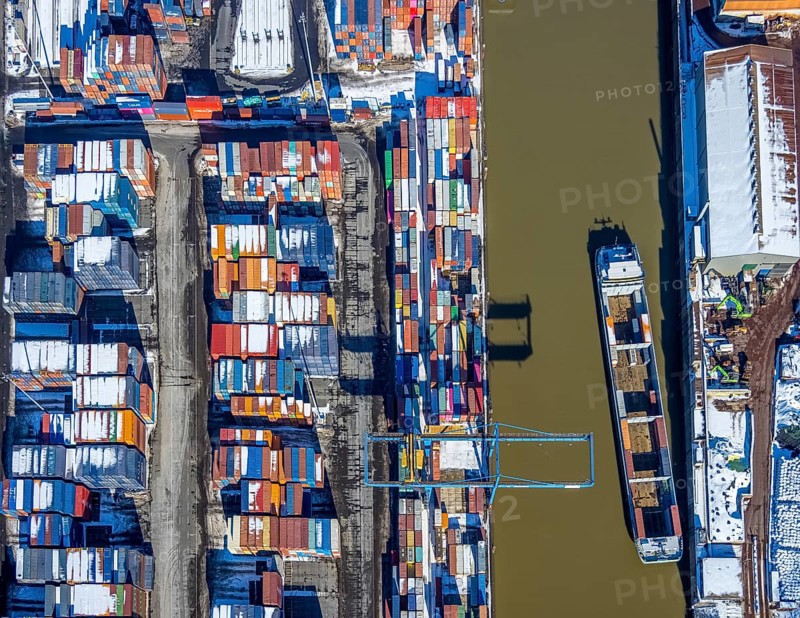 Aerial view, logport I, terminal, container port, DIT Duisburg Intermodal Terminal GmbH, D3T Duisburg Trimodal Terminal, river Rhine, Rheinhausen, Duisburg, Ruhr area, North Rhine-Westphalia, Germany, container, container terminal, container service, DE, Port of Duisburg, Duisport, Europe, freight traffic, port, port area, logistics, logistics centre, aerial view, aerial photography, aerial photography, snow, transport, transport service, overview, bird's-eye view, winter, birds-eyes view, overview