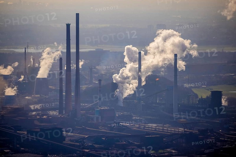 Aerial view, thyssenkrupp Steel Europe backlit, Marxloh, Duisburg, Ruhr area, North Rhine-Westphalia, Germany, DE, Europe, commercial enterprises, commercial area, commercial area, commercial location, commercial use, industrial area, industrial building, industrial location, aerial view, aerial photography, aerial photography, overview, bird's eye view, birds-eyes view, overview, industrial scenery, industrial romanticism, emission, air pollution, haziness