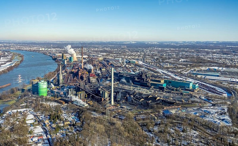 Aerial view, Hüttenwerke Krupp Mannesmann and Huckingen power station, Rheinaue Ehingen, Mündelheim, Duisburg, Ruhr area, North Rhine-Westphalia, Germany, DE, energy supplier, energy supplier, Europe, gas-fired power station, aerial view, aerial photography, aerial photography, snow, electricity supply company, overview, bird's eye view, winter, birds-eyes view, cleared roads, overview