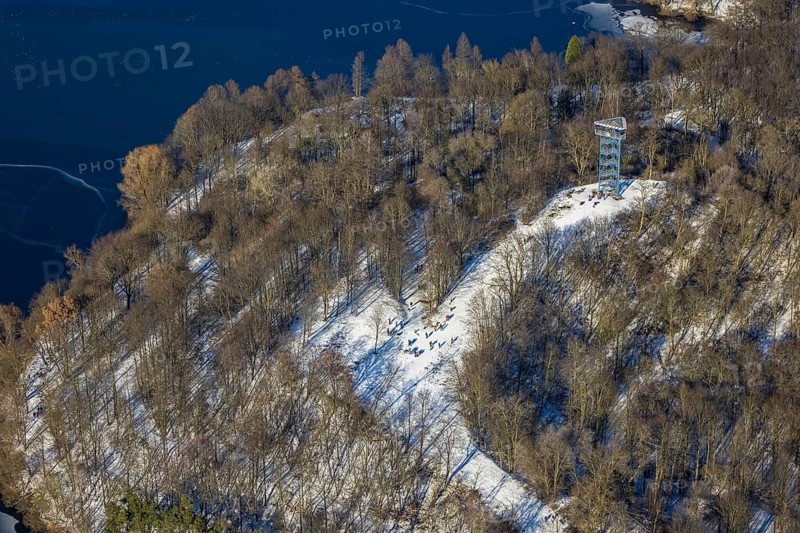 Aerial view, Sechs-Seen-Platte, sledging at the Haubachwald observation tower, Wedau, Duisburg, Ruhr area, North Rhine-Westphalia, Germany, viewing platform 6-Seen-Platte, observation tower, DE, Europe, aerial view, aerial photography, aerial photography, snow, overview, bird's eye view, forest area, winter, birds-eyes view, cleared roads, overview