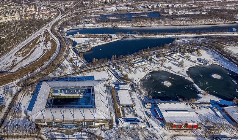 Aerial view, football stadium Schauinsland-Reisen-Arena, MSV Duisburg Arena, Sportpark Duisburg, Duisburg, Ruhr area, North Rhine-Westphalia, Germany, Arena, DE, Europe, leisure area, football pitch, football stadium, football club, aerial view, aerial photography, aerial photography, snow, sports, sports facilities, sports area, Sportpark Wedau, sports field, sports facility, stadium, overview, bird's eye view, winter, birds-eyes view, cleared roads, overview