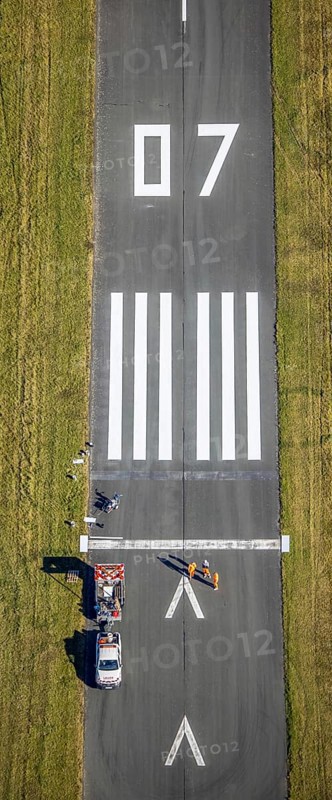 Aerial photograph, marking work on the runway at Brilon-Thülen airfield in the Thülen district of Brilon, Sauerland, North Rhine-Westphalia, Germany, construction project, construction site, Brilon, DE, Europe, airfield and landing site, aerial photograph, aerial photography, aerial photography, overview, bird's-eye view, overview