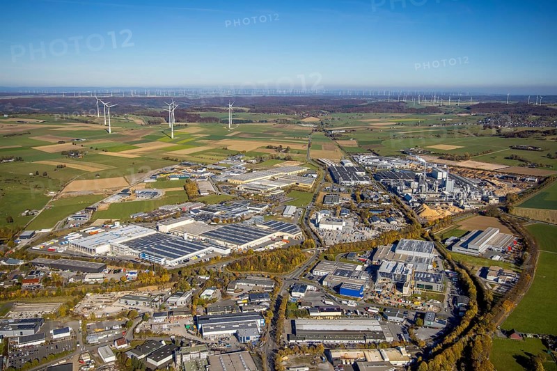 Aerial view, industrial area Brilon with Egger Holzwerkstoffe GmbH and wind farm in the background in Brilon, Sauerland, North Rhine-Westphalia, Germany, Brilon, DE, Europe, distant view, commercial enterprises, commercial area, commercial area, commercial location, commercial use, industrial area, industrial building, industrial site, aerial view, aerial photography, aerial photography, town view, townscape, overview, bird's-eye view, WEA, wind energy, wind energy plant, wind power, wind power plant, wind farm, wind turbines, birds-eyes view, overview