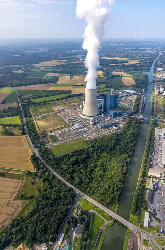 Aerial view of the power plant facilities and exhaust gas towers of the coal-fired power plant Datteln 4 Uniper power plant Im Löringhof at the Dortmund-Ems canal in Datteln in the Ruhr area in the federal state of North Rhine-Westphalia, Germany, Datteln, Ruhr area, North Rhine-Westphalia, DE, Europe, aerial view, birds-eyes view, aerial photography, aerial photography, overview, bird's eye view