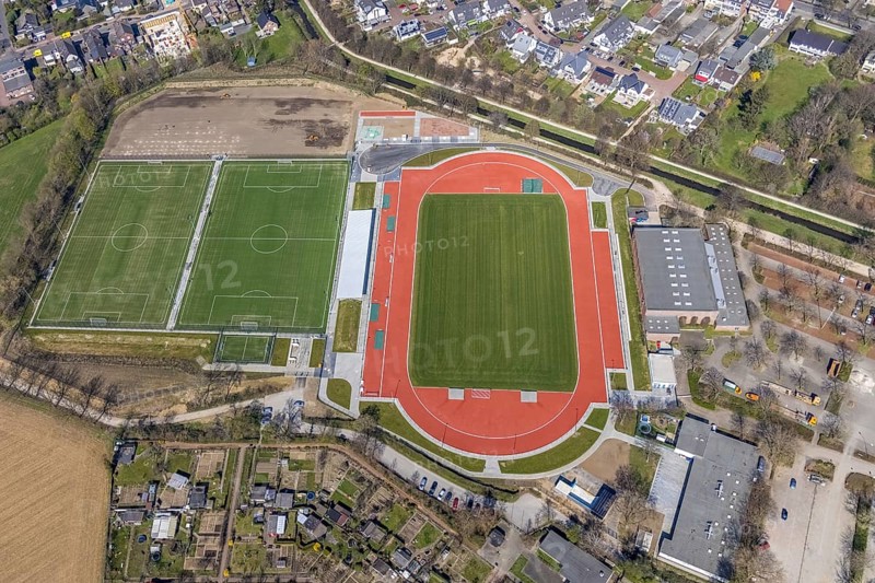 Aerial view, construction site new football pitches, sports facility, Spiel- und Sportverein 09 e.V. Dinslaken, gymnasium Hans-Efing-Sporthalle, Dinslaken, North Rhine-Westphalia, Germany, construction work, construction site, construction project, building site, DE, Europe, football pitch, football stadium, football club, athletics stadium, aerial view, aerial photography, aerial photography, tenement houses, Lower Rhine, Rhine, Ruhr area, sport, sports facilities, sports field, sports facility, stadium, overview, bird's eye view, birds-eyes view, overview