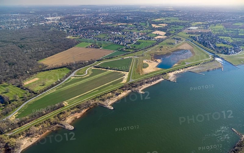 Aerial view, Rhine dyke construction site, new and old Emscher estuary, drop structure Emscher estuary, Emscher bridge Hagelstraße, Rheinaue Walsum, river Emscher, river Rhine, city border to Voerde, Eppinghoven, Dinslaken, Ruhr area, North Rhine-Westphalia, Germany, DE, Emscher, Emscher estuary, Emscher estuary into the Rhine, Emscher conversion, Europe, Frankfurter Straße, aerial view, aerial photography, aerial photography, estuary area, Lower Rhine, Rhine, Rhine floodplain, overview, bird's eye view, meadows and fields, living and life, birds-eyes view, new Emscher estuary Voerde city boundary, overview