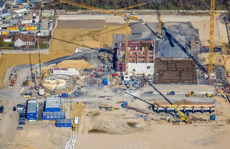 Aerial view, construction site new wood-fired power station at Thyssenstraße, Averbruch, Dinslaken, Ruhr area, North Rhine-Westphalia, Germany, architectural office Gramlich und Partner, construction work, building, construction area, building site, building plots, construction project, construction site, DE, Europe, cogeneration plant, power station, aerial view, aerial photography, aerial photography, new building, Lower Rhine, Rhine, overview, bird's-eye view, overview