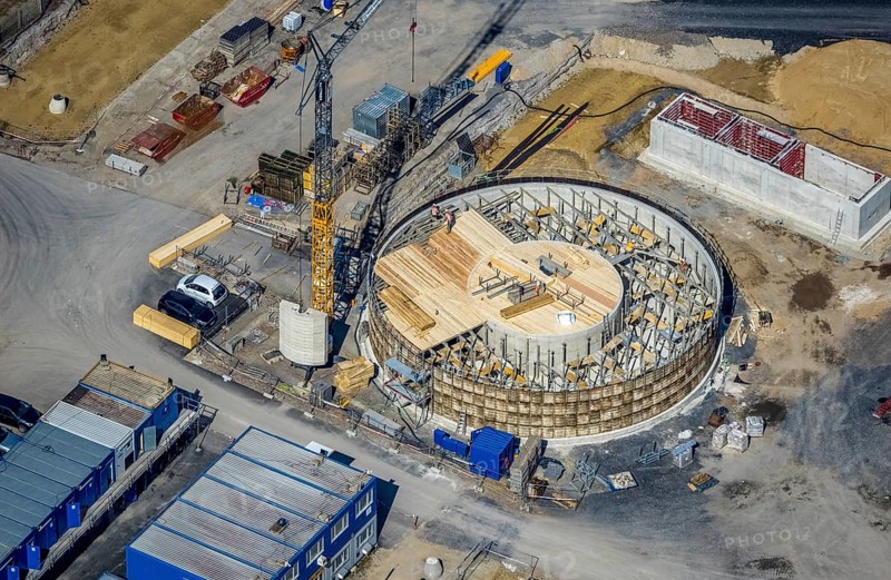 Aerial view, construction site new wood-fired power station at Thyssenstraße, Averbruch, Dinslaken, Ruhr area, North Rhine-Westphalia, Germany, architectural office Gramlich und Partner, construction work, building, construction area, building site, building plots, construction project, construction site, DE, Europe, cogeneration plant, power station, aerial view, aerial photography, aerial photography, new building, Lower Rhine, Rhine, overview, bird's-eye view, overview
