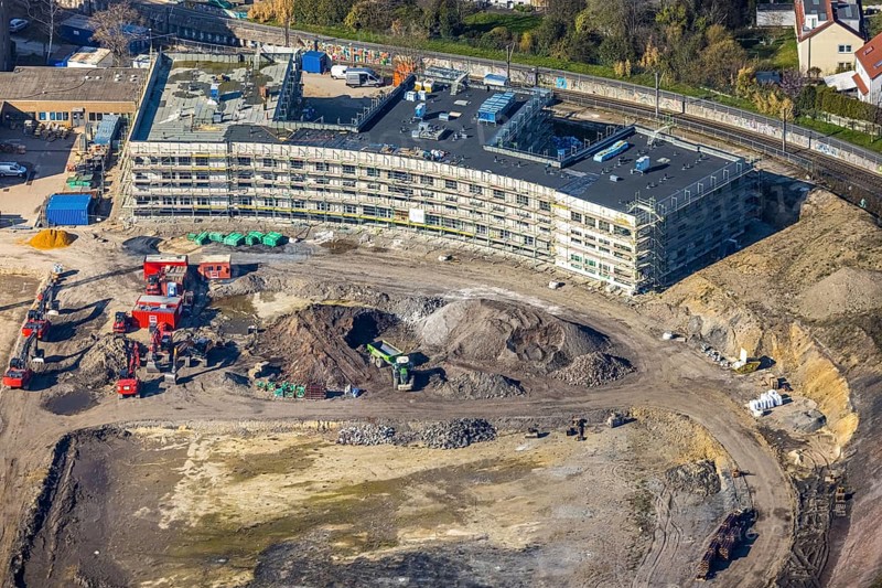 Aerial view, Hombrucher Bogen, construction site for commercial areas and apartment buildings, Hombruch, Dortmund, Ruhr area, North Rhine-Westphalia, Germany, construction work, construction area, construction site, building plots, construction project, construction site, DE, Europe, aerial view, aerial photography, aerial photography, new building, snow, overview, bird's eye view, winter, winter slump, winter landscape, birds-eyes view, former prefabricated concrete plant at Luisenglück, overview