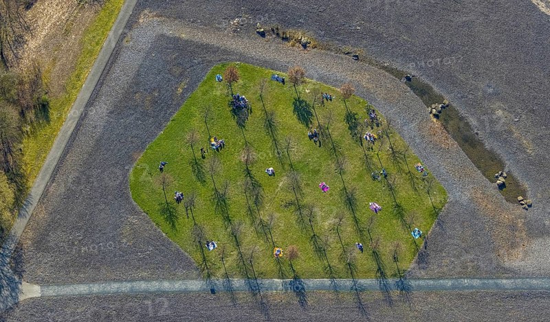 Aerial view, small sunbathing lawn on the slag heap between Westfalenpark, Emscher and viaduct Hympendahlbrücke, north of Phönix-West, spring weather on Dortmund's sunbathing lawns, Friedrichsfeld, Voerde, Ruhr area, North Rhine-Westphalia, Germany, DE, Europe, birds-eyes view, aerial view, aerial photography, aerial photography, overview, bird's eye view, spring, summer weather in March, Dortmund sunbathing lawns, sunbathing with Corona distance