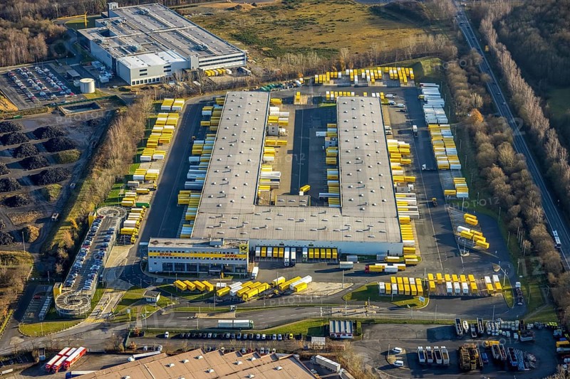 Aerial view of the industrial park Dorsten-Marl with the DHL freight centre in the Lünsingskuhle in Dorsten in the Ruhr area in North Rhine-Westphalia, Germany, DE, Germany, Dorsten, Europe, commercial enterprises, commercial area, commercial park, commercial location, commercial use, freight traffic, industrial area, industrial building, industrial location, logistics, logistics service, logistics service provider, logistics provider, logistics centre, aerial view, aerial photograph, aerial photography, aerial photography, North Rhine-Westphalia, Ruhr area, freight forwarding, transport, transport service, overview, bird's-eye view, overview