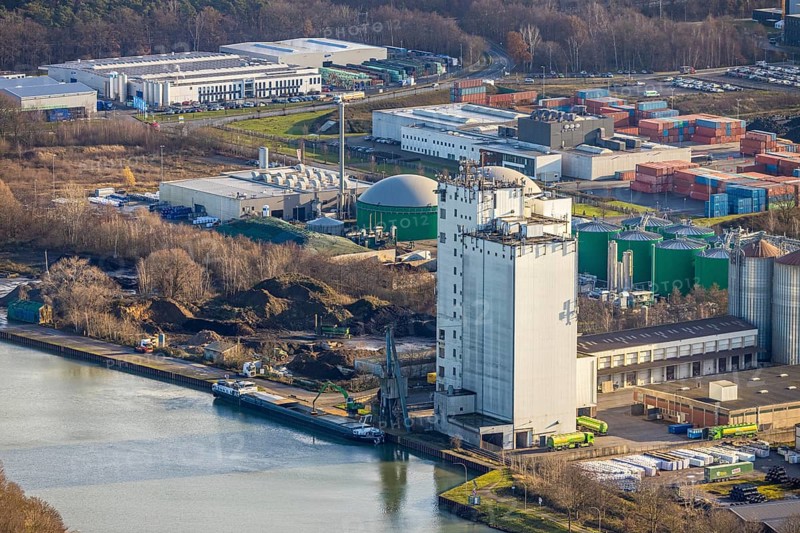 Aerial view Agravis silo tower concentrated feed plant in the industrial area east at the Wesel-Datteln canal in Dorsten in the Ruhr area in North Rhine-Westphalia, Germany, Agravis Raiffeisen AG, DE, Germany, Dorsten, Europe, commercial enterprises, commercial area, commercial park, commercial location, commercial use, industrial area, industrial building, industrial location, aerial view, aerial photograph, aerial photography, aerial photography, North Rhine-Westphalia, Ruhr area, overview, bird's-eye view, Wesel-Datteln Canal, birds-eyes view, compound feed manufacturer, overview