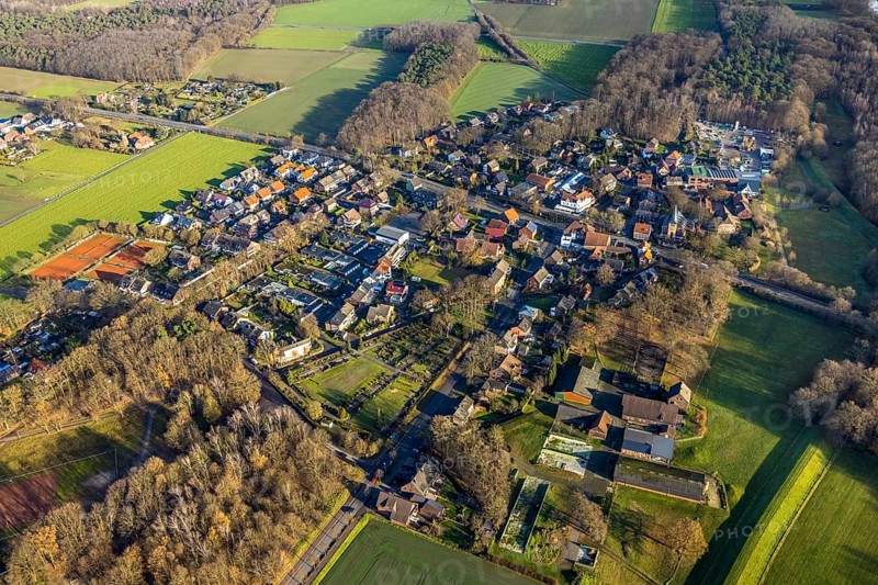 Aerial view of St Paul's Catholic Church in Dorfstraße and overview of the district of Hervest in Dorsten in the Ruhr area in North Rhine-Westphalia, Germany, place of worship, DE, Germany, Dorsten, Europe, religious community, place of worship, property tax, holy site, real estate, church, parish, denomination, aerial view, aerial photograph, aerial photography, aerial photography, North Rhine-Westphalia, religion, religious site, Ruhr area, overview, bird's eye view, residential area, living and life, residential area, residential buildings, quality of life, residential neighbourhood, housing estate, birds-eyes view, overview