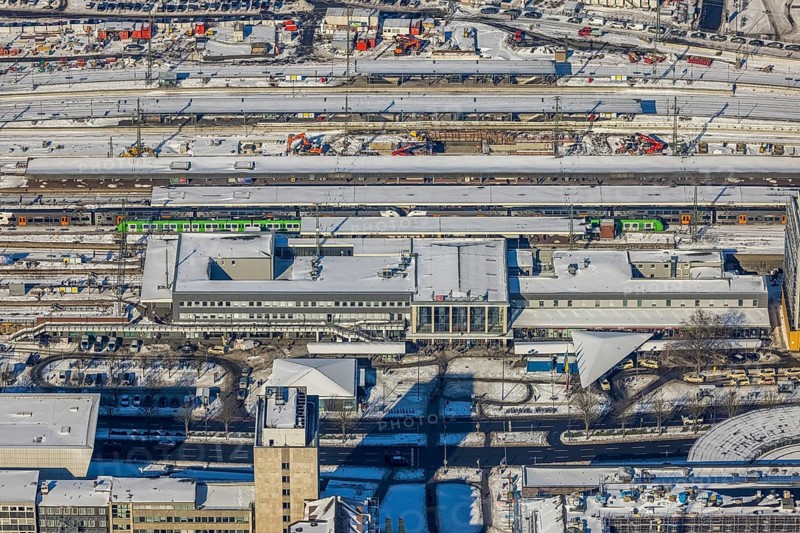 Aerial view, main station, city, Dortmund, Ruhr area, North Rhine-Westphalia, Germany, railway tracks, station, station forecourt, DE, Deutsche Bahn AG, Europe, railway tracks, main station, aerial view, aerial photography, aerial photography, snow, overview, bird's-eye view, winter, winter snowfall, winter landscape, birds-eyes view, overview, station concourse in the snow
