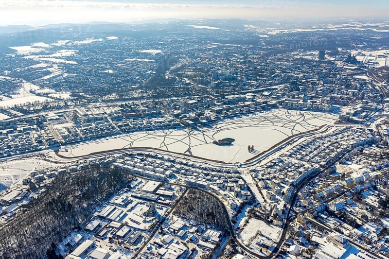 Aerial view, snowy Phoenix Lake, Hörde, Dortmund, Ruhr area, North Rhine-Westphalia, Germany, DE, Europe, aerial photography, aerial photography, aerial photography, snow, lake, overview, bird's eye view, winter, winter slump, winter landscape, birds-eyes view, overview, ice, ice surface, thin ice, break in the ice, breaks in the ice, snowy ice surface, artificial lake