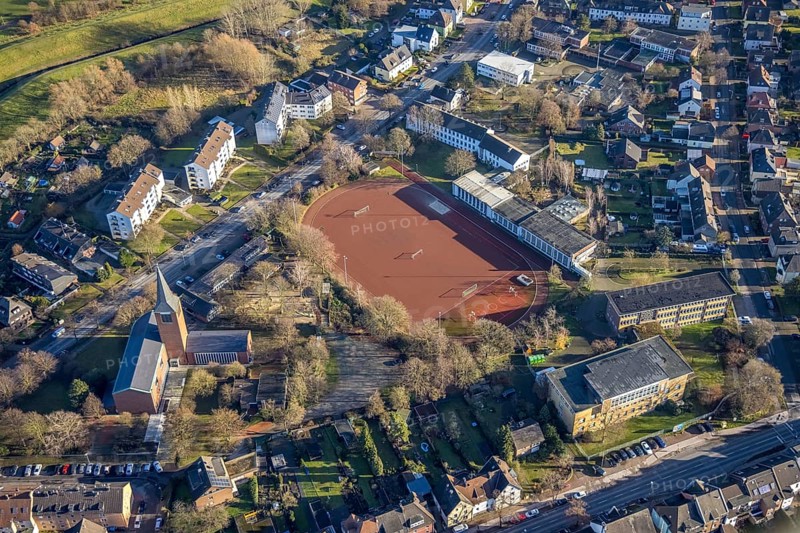 Aerial view of St John's Church in Beethovenstraße and St John's Catholic Kindergarten and Geschwister-Scholl-School next to the sports field in Dorsten in the Ruhr area in North Rhine-Westphalia, Germany, worship place, education, educational institution, DE, Germany, Dorsten, Europe, football pitch, religious community, place of worship, holy place, kindergarten, day nursery, day care centre, church, church community, day care centre, denomination, educational institute, aerial view, aerial photograph, aerial photography, aerial photography, North Rhine-Westphalia, religion, religious site, Ruhr area, school, sports facilities, sports field, sports facility, overview, bird's eye view, birds-eyes view, overview