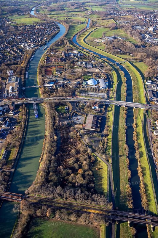 Aerial view Wesel-Datteln-Kanal with river Lippe and Lippeaue and Gymnasium Petrinum and leisure pool Atlantis at the Wesel-Datteln-Kanal in Dorsten in the Ruhr area in North Rhine-Westphalia, Germany, education, educational institution, DE, Germany, Dorsten, Europe, leisure facility, leisure area, leisure pool, leisure activities, leisure park, leisure enjoyment, grammar school, educational institute, aerial view, aerial photograph, aerial photography, aerial photography, North Rhine-Westphalia, Ruhr area, school, overview, bird's-eye view, Wesel-Datteln Canal, birds-eyes view, overview