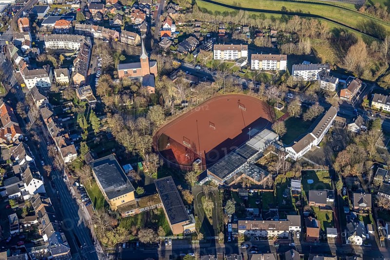 Aerial view of St John's Church in Beethovenstraße and St John's Catholic Kindergarten and Geschwister-Scholl-School next to the sports field in Dorsten in the Ruhr area in North Rhine-Westphalia, Germany, worship place, education, educational institution, DE, Germany, Dorsten, Europe, football pitch, religious community, place of worship, holy place, kindergarten, day nursery, day care centre, church, church community, day care centre, denomination, educational institute, aerial view, aerial photograph, aerial photography, aerial photography, North Rhine-Westphalia, religion, religious site, Ruhr area, school, sports facilities, sports field, sports facility, overview, bird's eye view, birds-eyes view, overview