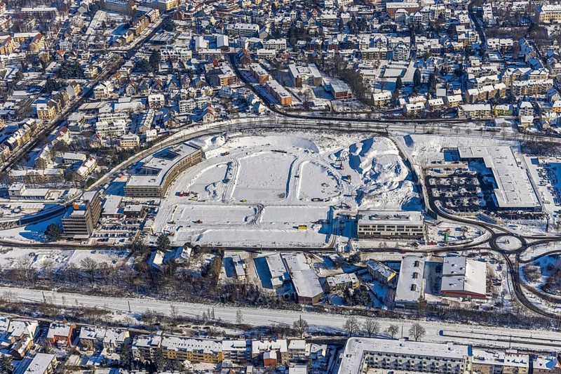 Aerial view, Hombrucher Bogen, construction site for commercial areas and apartment buildings, Barop, Dortmund, Ruhr area, North Rhine-Westphalia, Germany, construction work, construction area, construction site, building plots, construction project, construction site, DE, Europe, aerial view, aerial photography, aerial photography, new building, snow, overview, bird's eye view, winter, winter slump, winter landscape, birds-eyes view, former prefabricated concrete plant at Luisenglück, overview