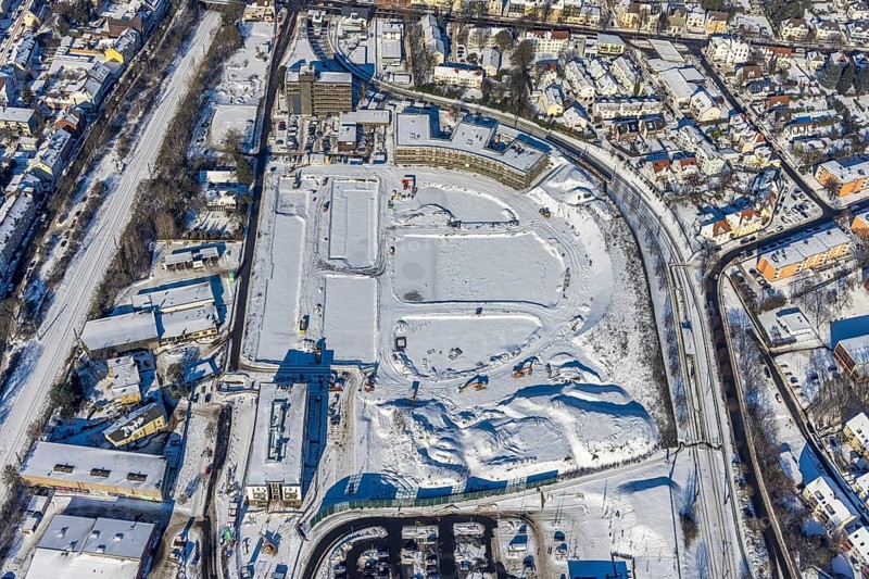 Aerial view, Hombrucher Bogen, construction site for commercial areas and apartment buildings, Barop, Dortmund, Ruhr area, North Rhine-Westphalia, Germany, construction work, construction area, construction site, building plots, construction project, construction site, DE, Europe, aerial view, aerial photography, aerial photography, new building, snow, overview, bird's eye view, winter, winter slump, winter landscape, birds-eyes view, former prefabricated concrete plant at Luisenglück, overview