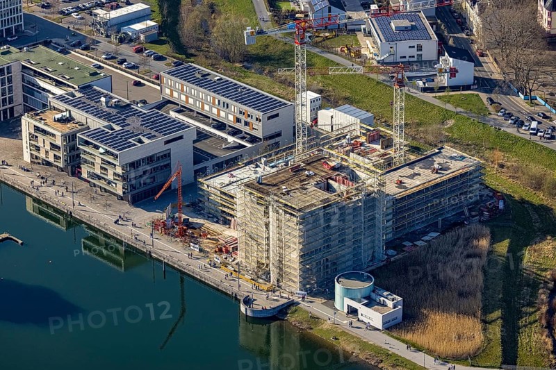 Aerial view, Phoenix-See, construction site for a new retirement home, high-rise building H12, Hörde, Dortmund, Ruhr area, North Rhine-Westphalia, Germany, construction work, construction area, construction site, building plots, construction crane, construction measure, construction project, construction site, DE, Europe, aerial view, aerial photography, aerial photography, new construction, Phoenix Lake, overview, bird's-eye view, former steelworks area Phoenix-East, artificial lake, overview