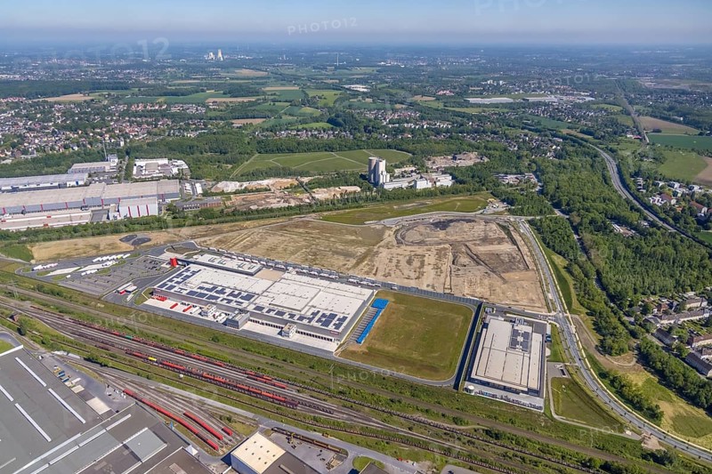 Aerial view, new REWE logistics centre and construction site of the former Westfalenhütte, Borsigplatz, Dortmund, Ruhr area, North Rhine-Westphalia, Germany, construction area, construction site, building plots, construction project, construction site, DE, Europe, commercial enterprises, commercial area, commercial park, commercial location, commercial use, industrial area, industrial building, industrial location, aerial view, aerial photography, aerial photography, overview, bird's-eye view, Westfalenhütte, birds-eyes view, overview