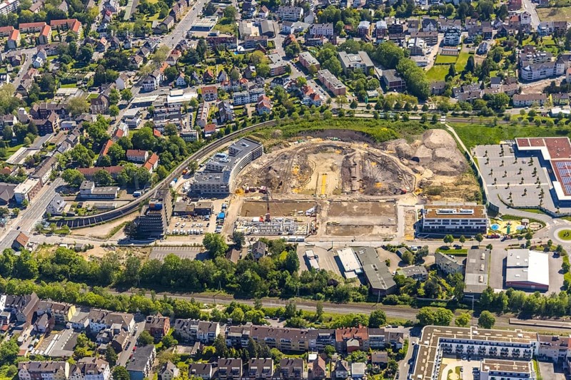 Aerial view, Hombrucher Bogen, construction site for commercial areas and apartment buildings, Menglinghausen, Dortmund, Ruhr area, North Rhine-Westphalia, Germany, construction work, construction area, construction site, building plots, construction project, construction site, DE, Europe, roundabout, roundabout, aerial view, aerial photography, aerial photography, new construction, snow, overview, bird's eye view, winter, winter slump, winter landscape, birds-eyes view, former prefabricated concrete plant at Luisenglück, overview