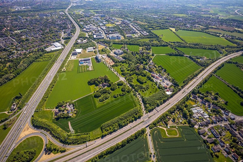 Aerial view, Dortmund University of Technology and Dortmund Technology Park, construction site and new construction Sebrathweg office quarter, A40 motorway, Oespel, Dortmund, Ruhr area, North Rhine-Westphalia, Germany, construction work, construction area, construction site, building plots, construction measure, row of trees, construction project, construction site, DE, Europe, commercial enterprises, commercial area, commercial area, commercial site, commercial use, university, industrial area, industrial site, aerial view, aerial photography, aerial photography, new building, TU Dortmund, Dortmund University of Technology, technology centre, overview, bird's-eye view, birds-eyes view, overview