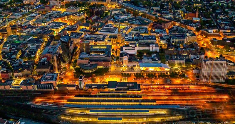 Aerial view, Dortmund main station and city centre, Harenberg City-Center, RWE Tower, German Football Museum, City, Dortmund, Ruhr area, North Rhine-Westphalia, Germany, railway station, station forecourt, DE, Deutsche Bahn AG, twilight photography, Europe, football, HCC Dortmund, Harenberg Kommunikation Verlags- u. Medien GmbH, central station, main station, light pollution, aerial view, aerial photography, aerial photography, museum, night, night shot, night flight, Dortmund City and State Library, overview, bird's-eye view, illuminated streets, birds-eyes view, nightflight, overview