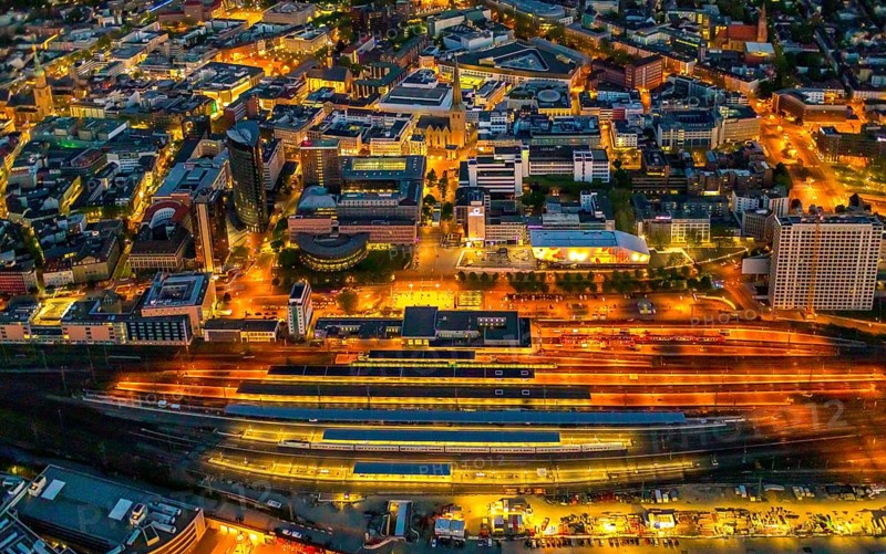 Aerial view, Dortmund main station and city centre, Harenberg City-Center, RWE Tower, German Football Museum, City, Dortmund, Ruhr area, North Rhine-Westphalia, Germany, railway station, station forecourt, DE, Deutsche Bahn AG, twilight photography, Europe, football, HCC Dortmund, Harenberg Kommunikation Verlags- u. Medien GmbH, central station, main station, light pollution, aerial view, aerial photography, aerial photography, museum, night, night shot, night flight, Dortmund City and State Library, overview, bird's-eye view, illuminated streets, birds-eyes view, nightflight, overview