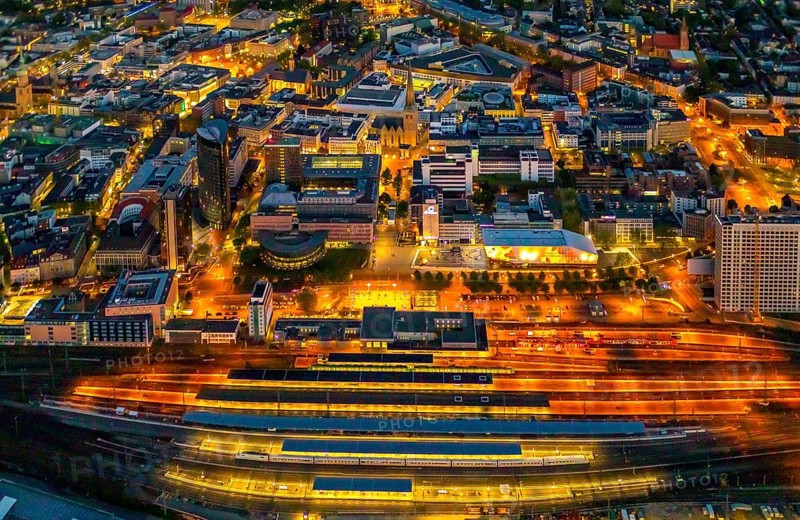 Aerial view, Dortmund main station and city centre, Harenberg City-Center, RWE Tower, German Football Museum, City, Dortmund, Ruhr area, North Rhine-Westphalia, Germany, railway station, station forecourt, DE, Deutsche Bahn AG, twilight photography, Europe, football, HCC Dortmund, Harenberg Kommunikation Verlags- u. Medien GmbH, central station, main station, light pollution, aerial view, aerial photography, aerial photography, museum, night, night shot, night flight, Dortmund City and State Library, overview, bird's-eye view, illuminated streets, birds-eyes view, nightflight, overview
