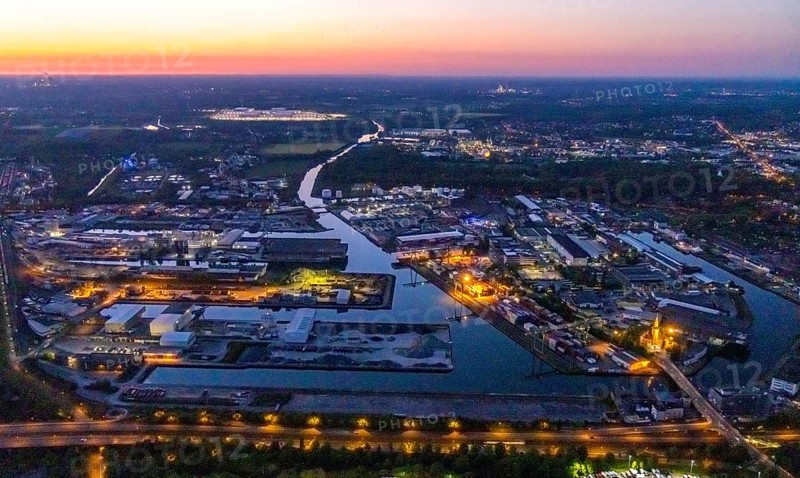 Aerial view, night view of Dortmund harbour, historical building old harbour office, container terminal, container, coal port of the inland portDortmunder Hafen AG in Dortmund in the federal state of North Rhine-Westphalia, Germany