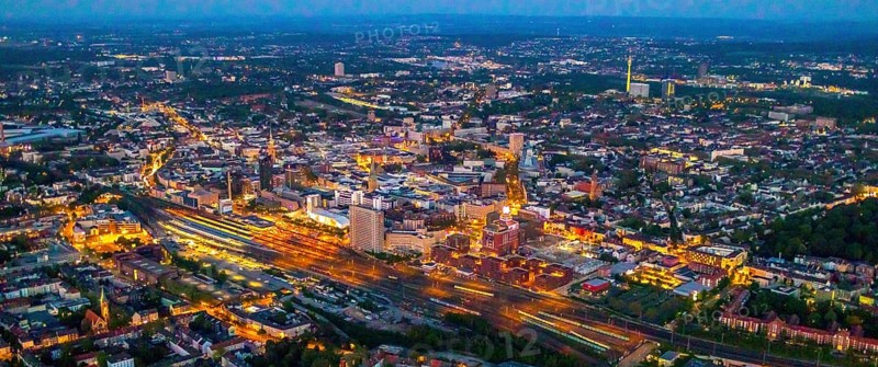 Aerial view, Dortmund main station and city centre, Dortmund U-Tower, city, Dortmund, Ruhr area, North Rhine-Westphalia, Germany, railway station, DE, Deutsche Bahn AG, twilight photography, Europe, main station, central station, culture, light pollution, aerial photography, aerial photography, aerial photography, night, night photography, night flight, overview, events, venue, event location, event centre, bird's eye view, illuminated streets, birds-eyes view, cultural use, nightflight, overview