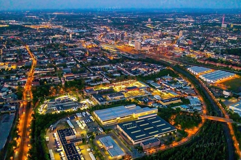 Aerial view, Hafen-Süd commercial area, Dortmund main station and city centre, Dortmund U-Tower, City, Dortmund, Ruhr area, North Rhine-Westphalia, Germany, railway station, DE, Deutsche Bahn AG, twilight photography, Europe, commercial enterprises, commercial area, commercial location, commercial use, main station, main railway station, industrial area, industrial site, culture, light pollution, aerial view, aerial photography, aerial photography, night, night photography, night flight, overview, events, event location, event venue, event centre, bird's-eye view, illuminated streets, birds-eyes view, cultural use, nightflight, overview