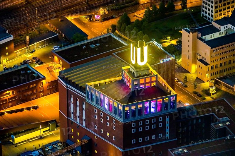 Aerial view, Dortmunder U-Turm, Dorstfelder Brücke, Dortmund, Ruhr area, North Rhine-Westphalia, Germany, DE, Dortmunder U Centre for Art and Creativity, twilight photography, Europe, culture, art, light pollution, aerial photography, aerial photography, night, night photography, night flight, overview, events, venue, event location, event centre, bird's-eye view, illuminated streets, birds-eyes view, cultural use, nightflight, overview