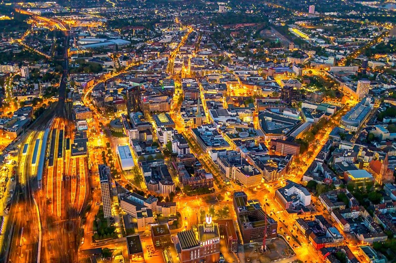 Aerial view, Dortmund main station and city centre, Harenberg City-Center, RWE Tower, German Football Museum, City, Dortmund, Ruhr area, North Rhine-Westphalia, Germany, railway station, station forecourt, DE, Deutsche Bahn AG, twilight photography, Europe, football, HCC Dortmund, Harenberg Kommunikation Verlags- u. Medien GmbH, central station, main station, light pollution, aerial view, aerial photography, aerial photography, museum, night, night shot, night flight, Dortmund City and State Library, overview, bird's-eye view, illuminated streets, birds-eyes view, nightflight, overview