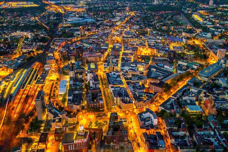 Aerial view, Dortmund main station and city centre, Harenberg City-Center, RWE Tower, German Football Museum, City, Dortmund, Ruhr area, North Rhine-Westphalia, Germany, railway station, station forecourt, DE, Deutsche Bahn AG, twilight photography, Europe, football, HCC Dortmund, Harenberg Kommunikation Verlags- u. Medien GmbH, central station, main station, light pollution, aerial view, aerial photography, aerial photography, museum, night, night shot, night flight, Dortmund City and State Library, overview, bird's-eye view, illuminated streets, birds-eyes view, nightflight, overview