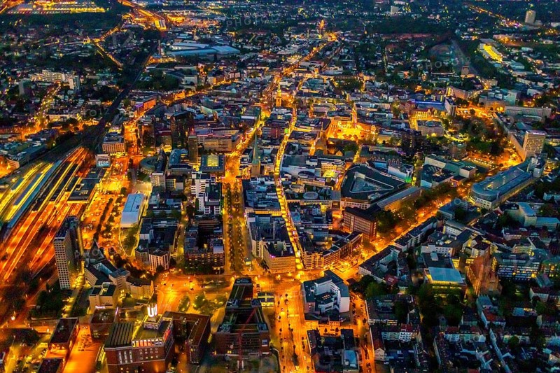 Aerial view, Dortmund main station and city centre, Harenberg City-Center, RWE Tower, German Football Museum, City, Dortmund, Ruhr area, North Rhine-Westphalia, Germany, railway station, station forecourt, DE, Deutsche Bahn AG, twilight photography, Europe, football, HCC Dortmund, Harenberg Kommunikation Verlags- u. Medien GmbH, central station, main station, light pollution, aerial view, aerial photography, aerial photography, museum, night, night shot, night flight, Dortmund City and State Library, overview, bird's-eye view, illuminated streets, birds-eyes view, nightflight, overview