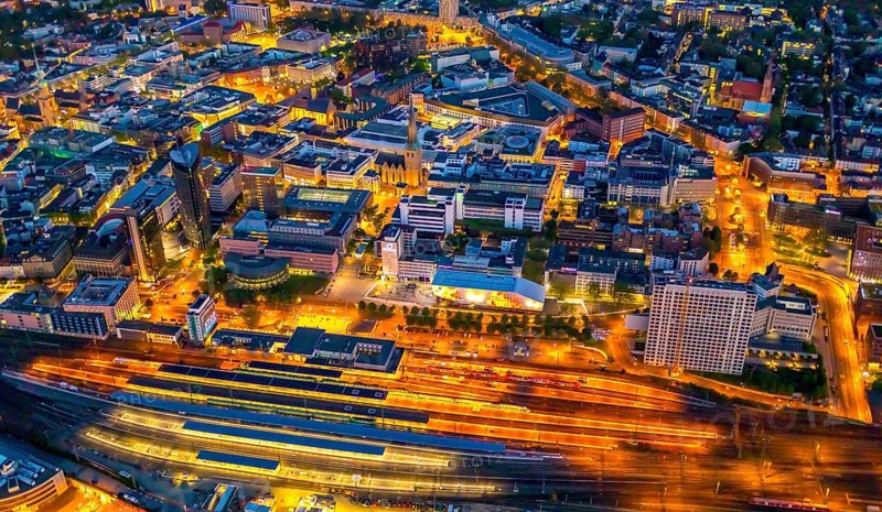 Aerial view, Dortmund main station and city centre, Harenberg City-Center, RWE Tower, German Football Museum, City, Dortmund, Ruhr area, North Rhine-Westphalia, Germany, railway station, station forecourt, DE, Deutsche Bahn AG, twilight photography, Europe, football, HCC Dortmund, Harenberg Kommunikation Verlags- u. Medien GmbH, central station, main station, light pollution, aerial view, aerial photography, aerial photography, museum, night, night shot, night flight, Dortmund City and State Library, overview, bird's-eye view, illuminated streets, birds-eyes view, nightflight, overview