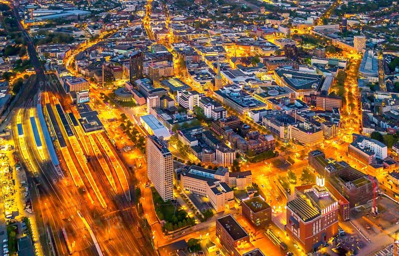 Aerial view, Dortmund main station and city centre, Harenberg City-Center, RWE Tower, German Football Museum, City, Dortmund, Ruhr area, North Rhine-Westphalia, Germany, railway station, station forecourt, DE, Deutsche Bahn AG, twilight photography, Europe, football, HCC Dortmund, Harenberg Kommunikation Verlags- u. Medien GmbH, central station, main station, light pollution, aerial view, aerial photography, aerial photography, museum, night, night shot, night flight, Dortmund City and State Library, overview, bird's-eye view, illuminated streets, birds-eyes view, nightflight, overview