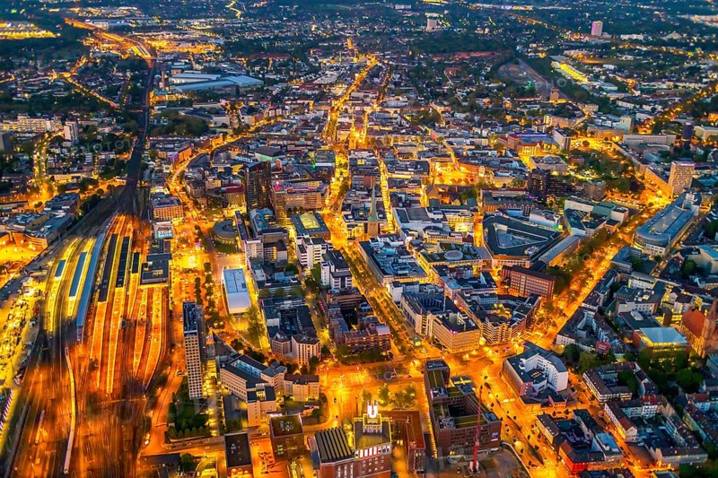 Aerial view, Dortmund main station and city centre, Harenberg City-Center, RWE Tower, German Football Museum, City, Dortmund, Ruhr area, North Rhine-Westphalia, Germany, railway station, station forecourt, DE, Deutsche Bahn AG, twilight photography, Europe, football, HCC Dortmund, Harenberg Kommunikation Verlags- u. Medien GmbH, central station, main station, light pollution, aerial view, aerial photography, aerial photography, museum, night, night shot, night flight, Dortmund City and State Library, overview, bird's-eye view, illuminated streets, birds-eyes view, nightflight, overview