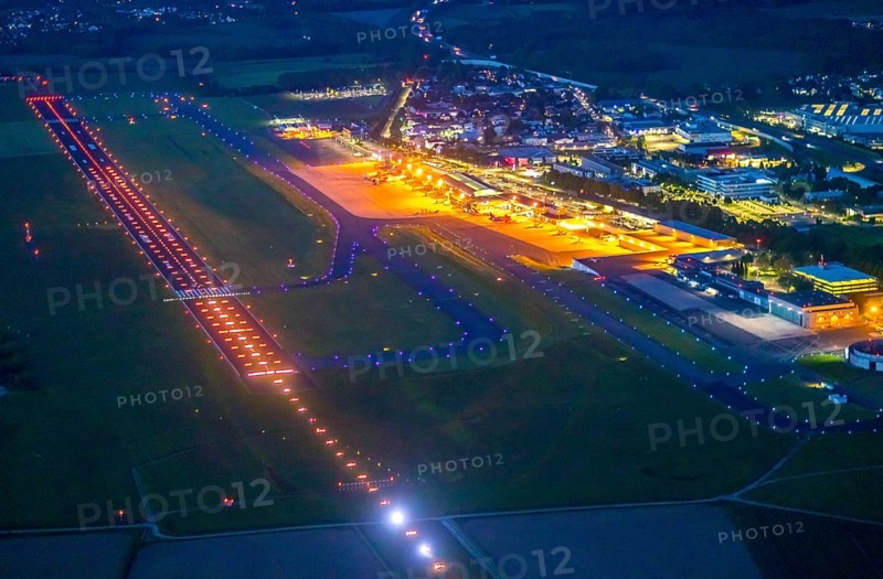 Aerial photo, Dortmund Airport, DTM, Wickede, Dortmund, Ruhr area, North Rhine-Westphalia, Germany, terminal building, DE, Dortmund Airport DTM, twilight photography, reception building, Europe, flight emission, airport, aircraft noise, airfield, runway, light pollution, aerial photograph, aerial photography, aerial photography, night, night photography, night flight, runway, overview, bird's-eye view, illuminated streets, birds-eyes view, nightflight, overview