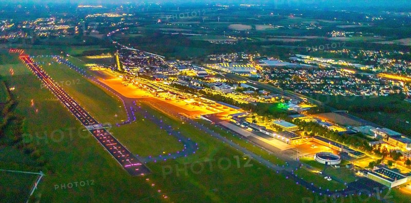 Aerial photo, Dortmund Airport, DTM, Wickede, Dortmund, Ruhr area, North Rhine-Westphalia, Germany, terminal building, DE, Dortmund Airport DTM, twilight photography, reception building, Europe, flight emission, airport, aircraft noise, airfield, runway, light pollution, aerial photograph, aerial photography, aerial photography, night, night photography, night flight, runway, overview, bird's-eye view, illuminated streets, birds-eyes view, nightflight, overview