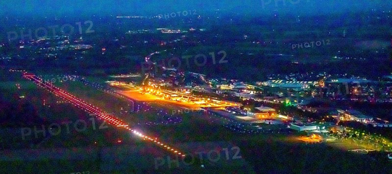 Aerial photo, Dortmund Airport, DTM, Wickede, Dortmund, Ruhr area, North Rhine-Westphalia, Germany, terminal building, DE, Dortmund Airport DTM, twilight photography, reception building, Europe, flight emission, airport, aircraft noise, airfield, runway, light pollution, aerial photograph, aerial photography, aerial photography, night, night photography, night flight, runway, overview, bird's-eye view, illuminated streets, birds-eyes view, nightflight, overview