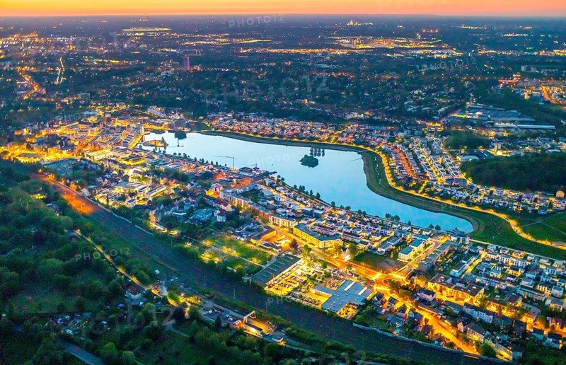 Aerial view, Phoenix Lake, Hörde, Dortmund, Ruhr area, North Rhine-Westphalia, Germany, sunset, DE, twilight photography, Europe, distant view, property tax, real estate, light pollution, aerial photography, aerial photography, night, night photography, night flight, Phoenix Lake, lake, overview, bird's eye view, residential area, living and life, residential area, residential buildings, quality of life, residential neighbourhood, illuminated streets, birds-eyes view, nightflight, overview
